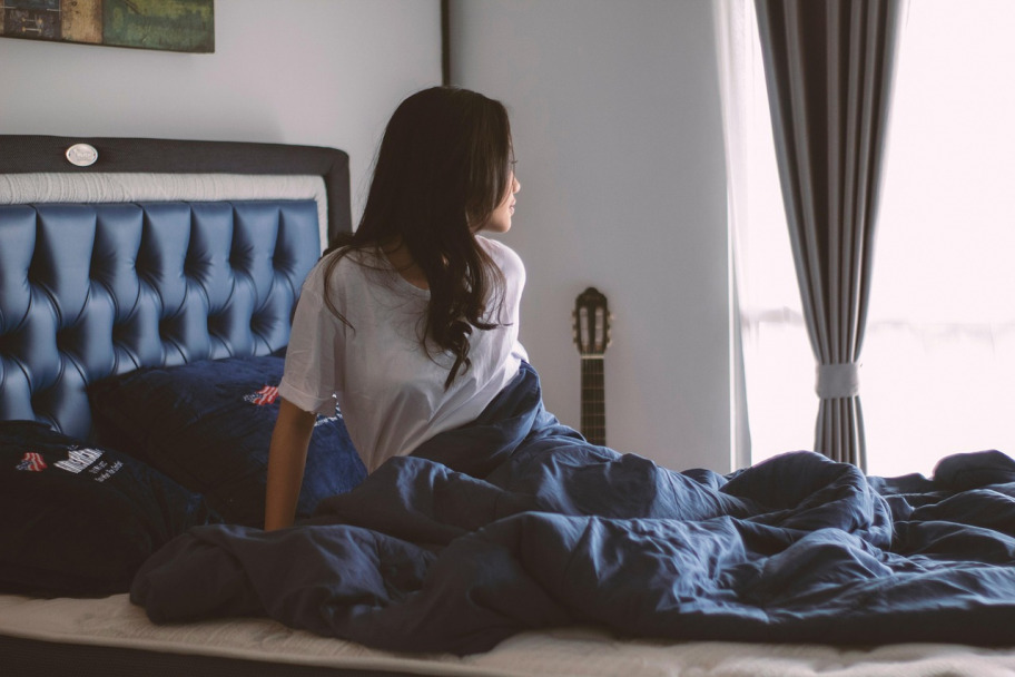 woman breathing to calm down at home